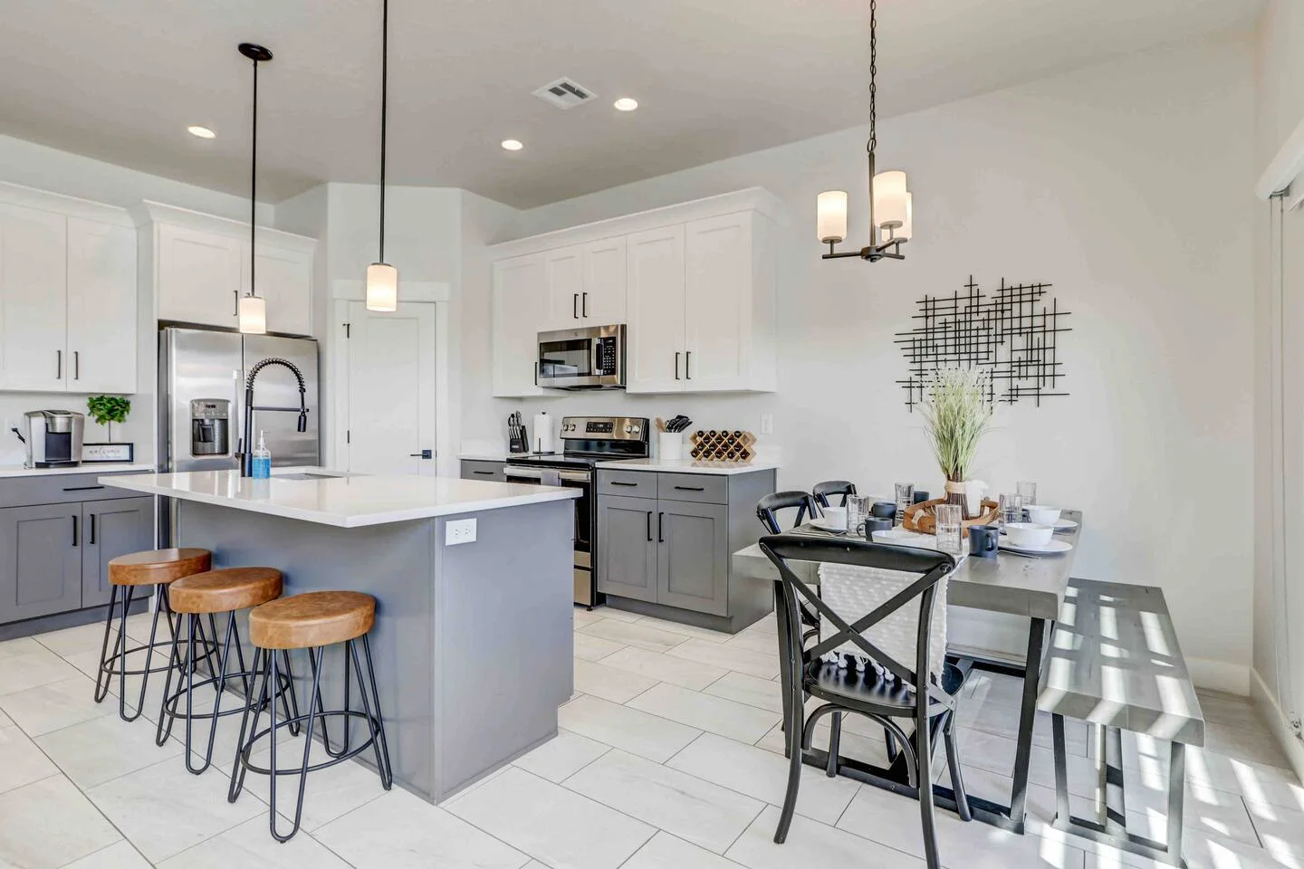 Full kitchen with island seating, oven and dining area